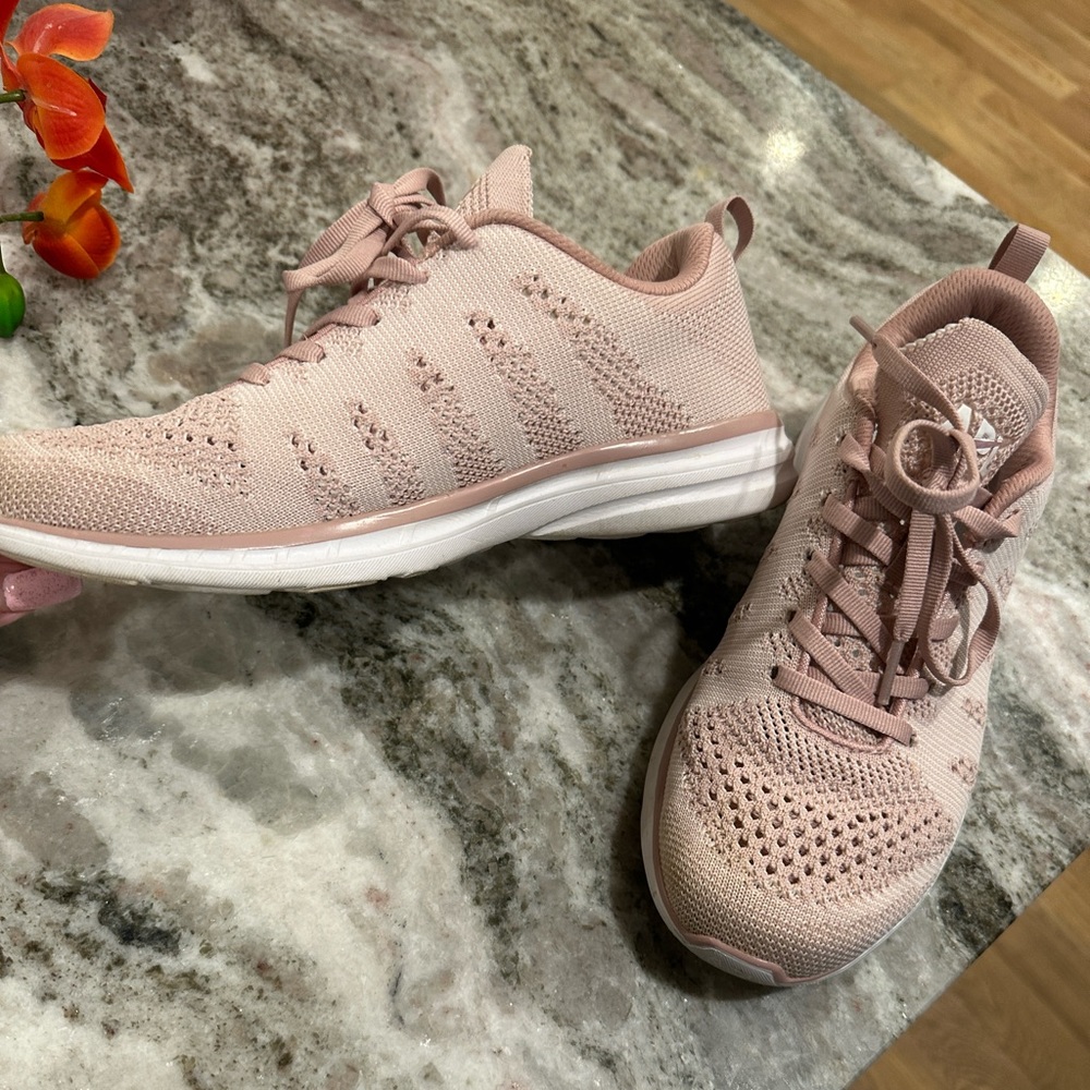 Apl pink athletic shoe